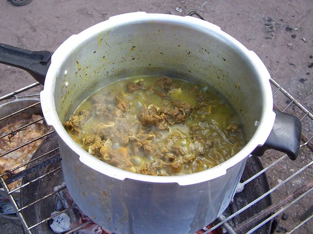 Curry Goat bring cooked